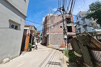 Tự ý xây nhà quá diện tích đất ở có được chuyển đổi để cấp sổ đỏ?